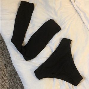 Across the shoulder black swim suit